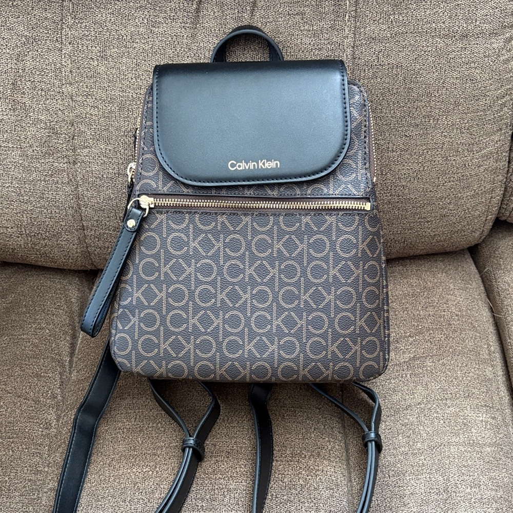 Calvin Klein Monogram Backpack in Brown and Black